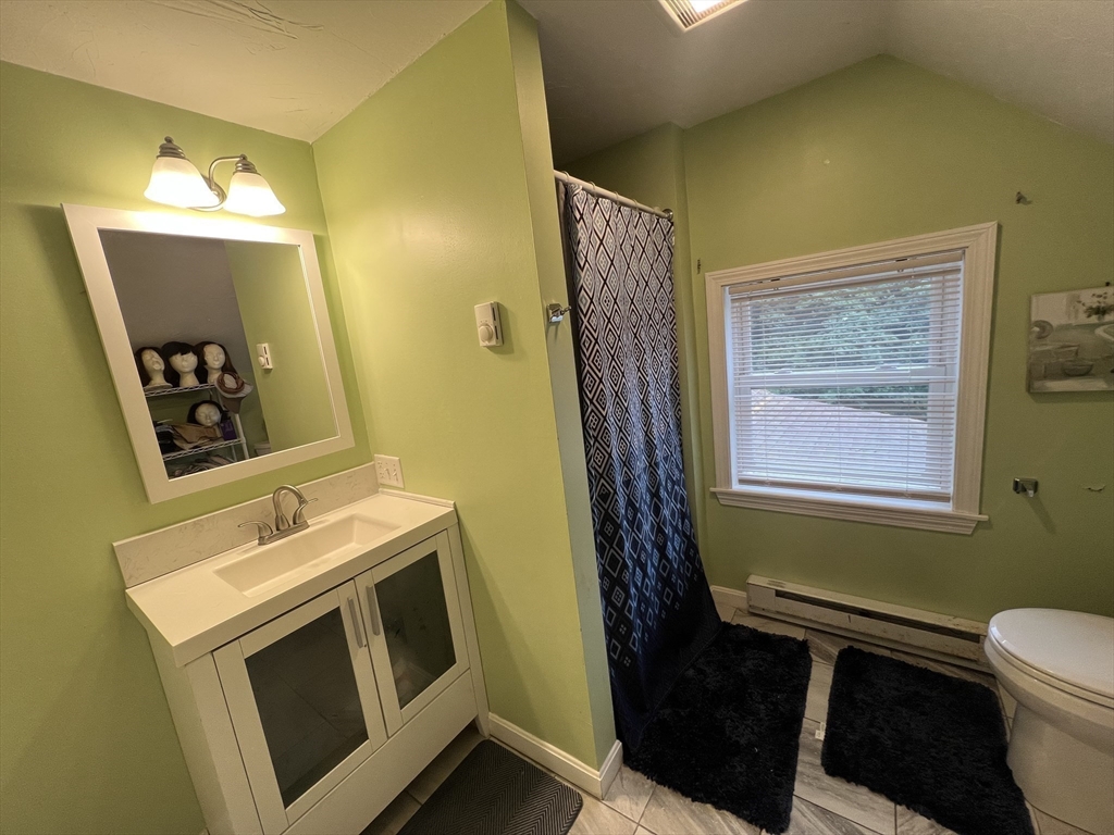 40 Chestnut Street Milford, MA 01757 - Photo 16 of 19 a bathroom with a sink and a mirror