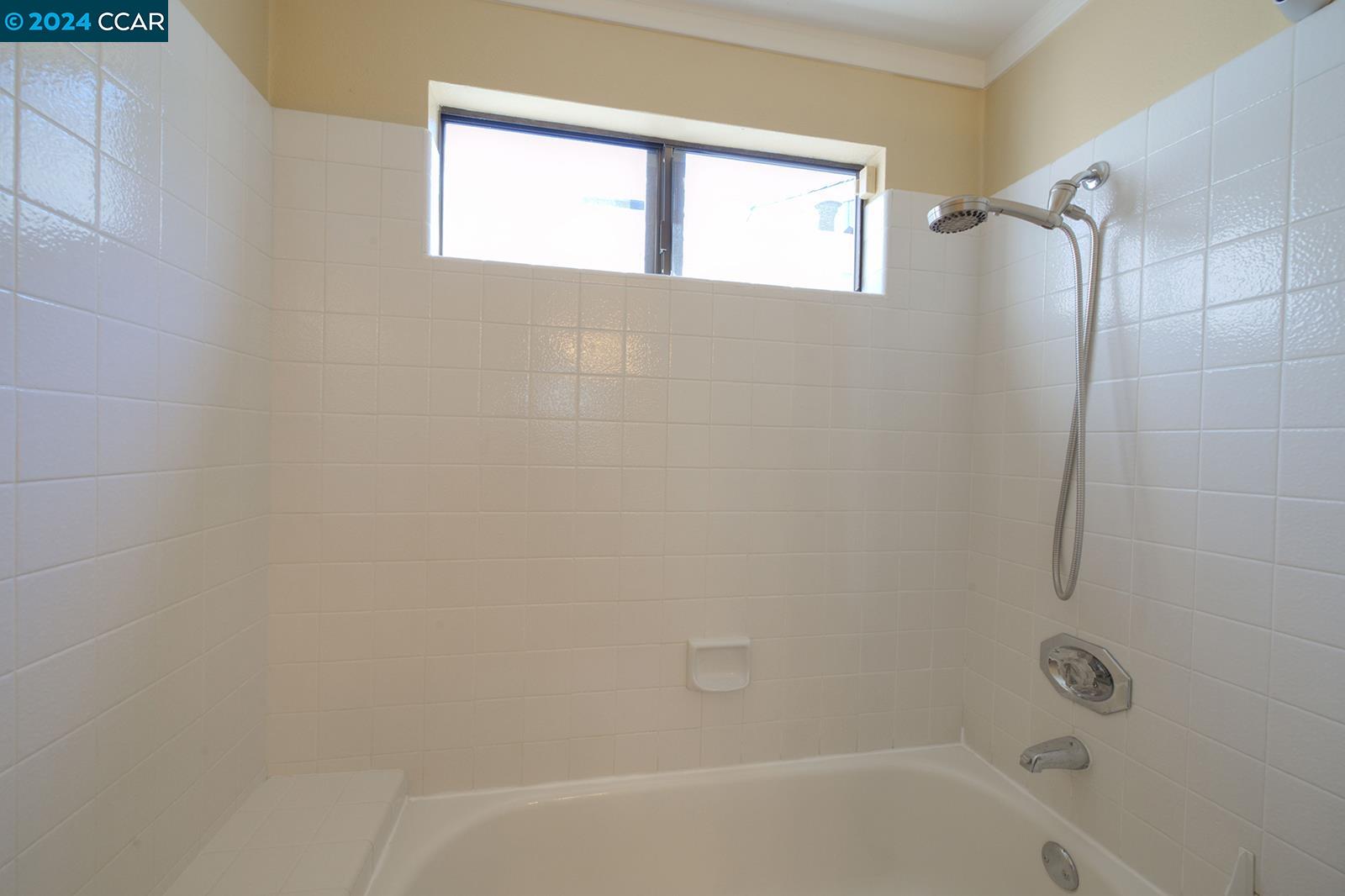 564 Cambrian Way Danville, CA 94526 - Photo 10 of 13 a bathroom with a bathtub and shower