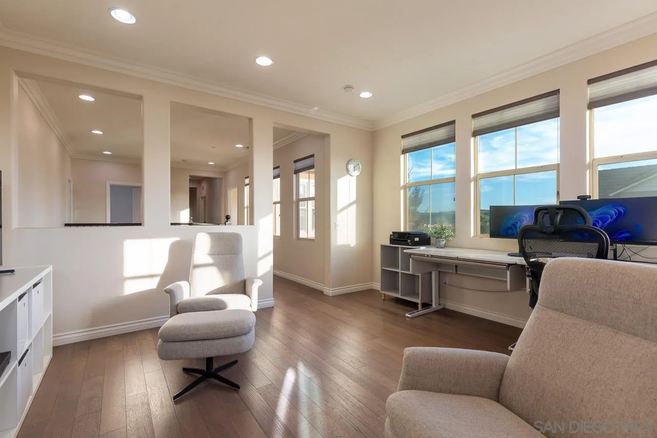 15622 Potomac Ridge Road San Diego, CA 92127 - Photo 15 of 49 a living room with furniture and a large window
