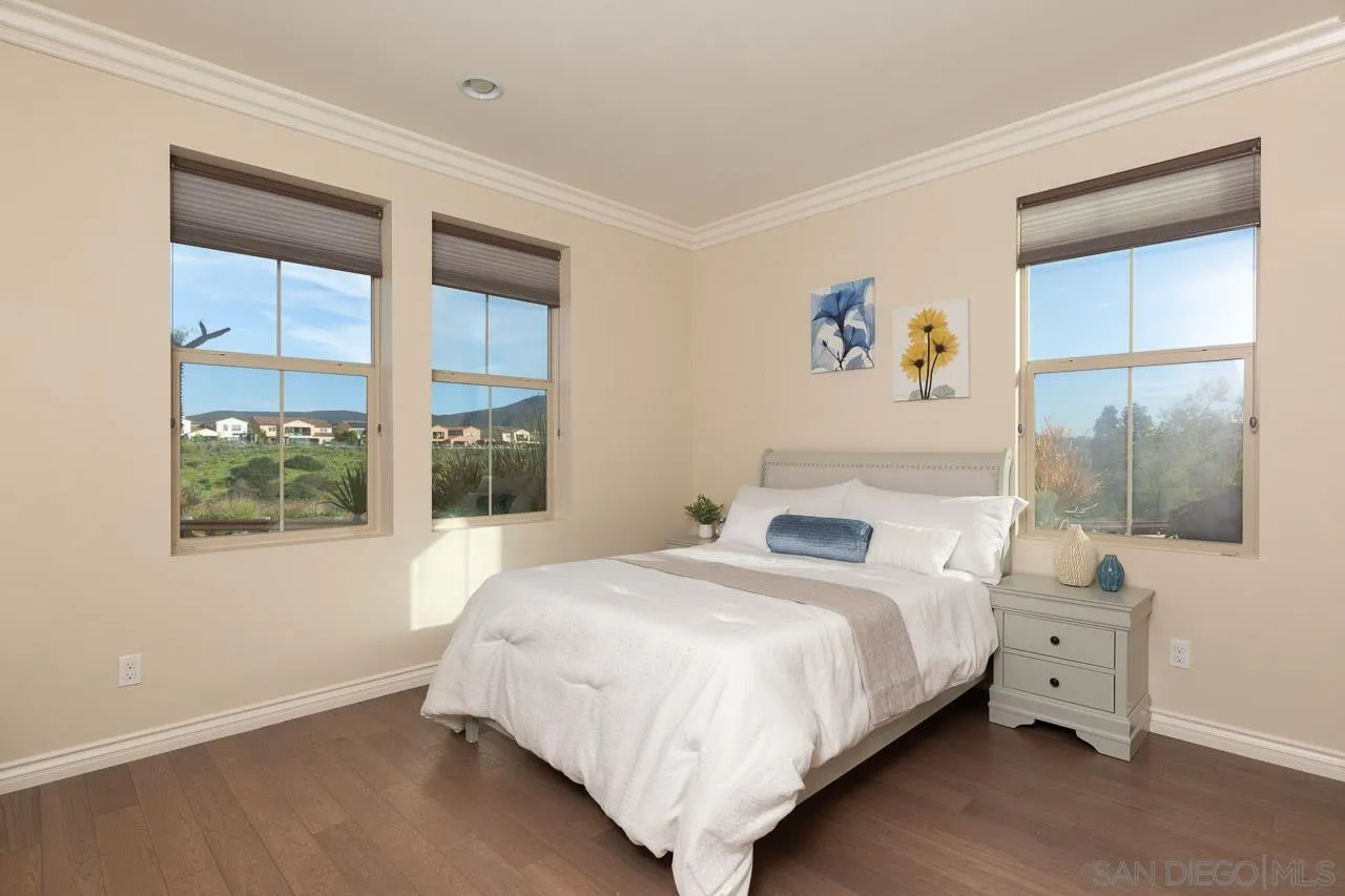 15622 Potomac Ridge Road San Diego, CA 92127 - Photo 34 of 49 a bedroom with a bed and window