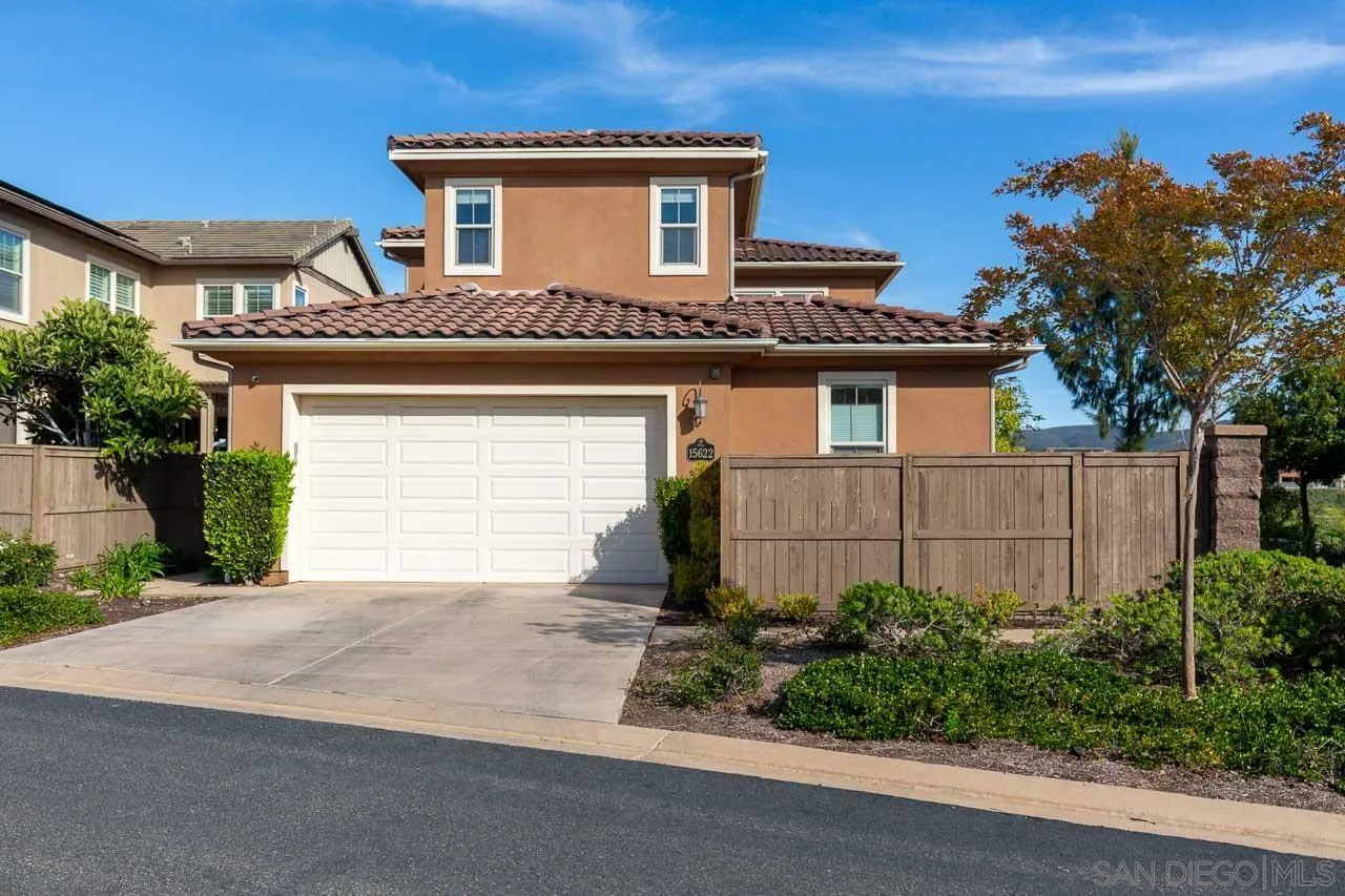 15622 Potomac Ridge Road San Diego, CA 92127 - Photo 4 of 49 a front view of a house with garden