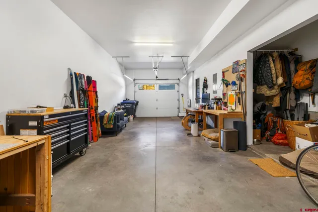 a view of a storage area with shoes and chairs