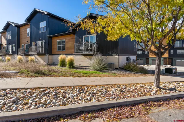 a front view of a house with street