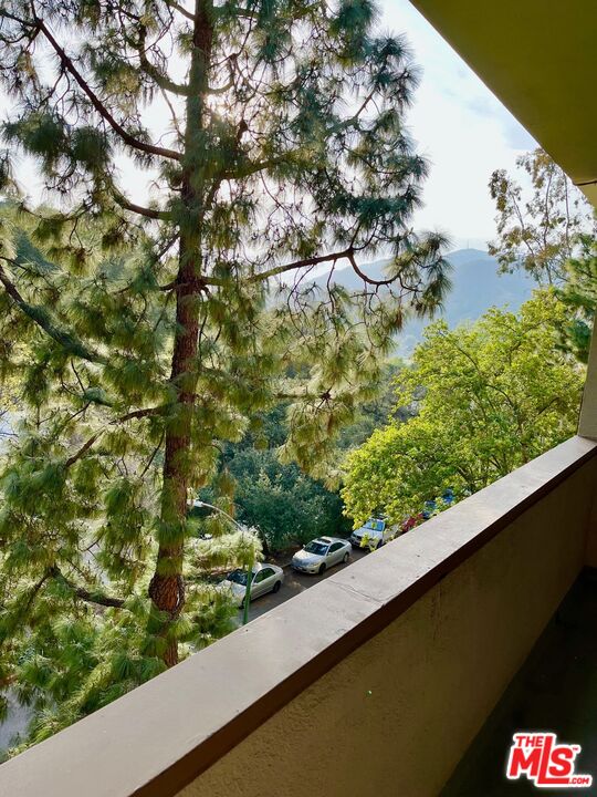 1935 Alpha Road, Unit 114 Glendale, CA 91208 - Photo 6 of 12 a view of a garden from a balcony