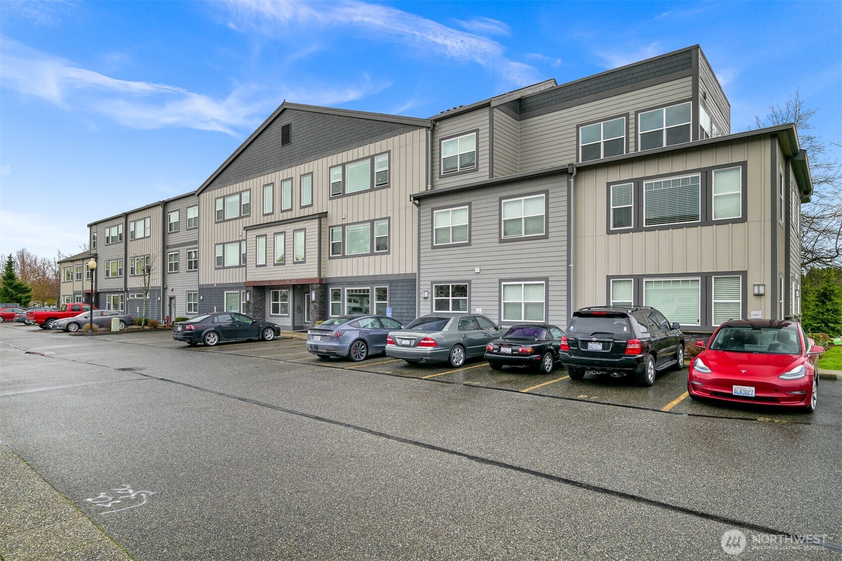 8844 Depot Road, Unit B211 Lynden, WA 98264 - Photo 27 of 29 a cars parked in front of a building