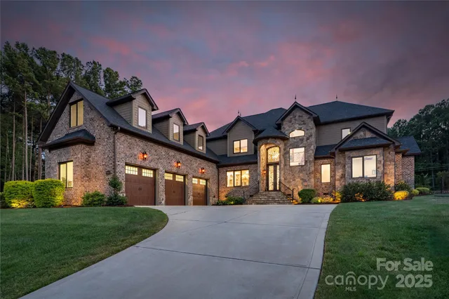 a front view of house and yard with green space