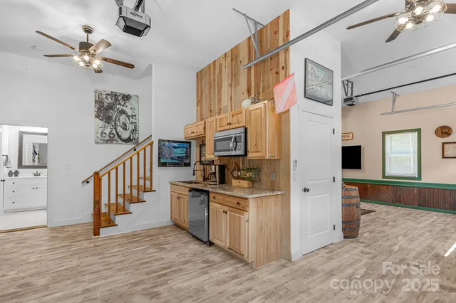 a view of a kitchen with a sink and dishwasher kitchen view
