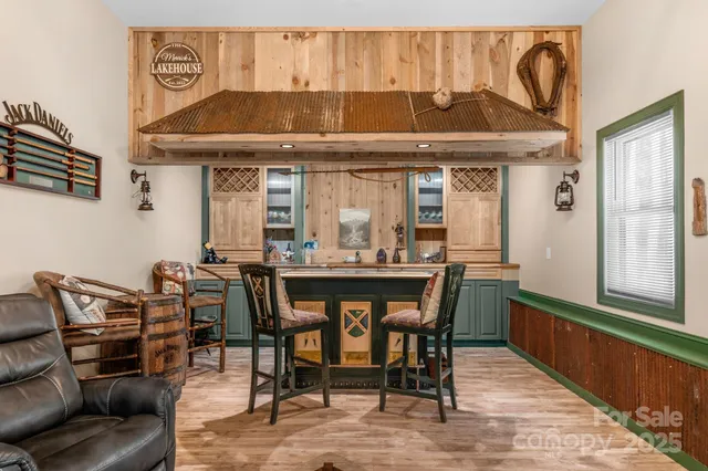 a dinning table and chairs in a living room