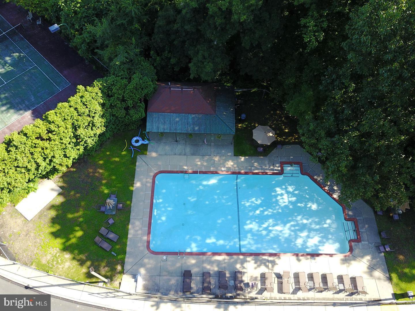 800 Avondale Road, Unit 6C Wallingford, PA 19086 - Photo 24 of 25 a view of a house with a yard
