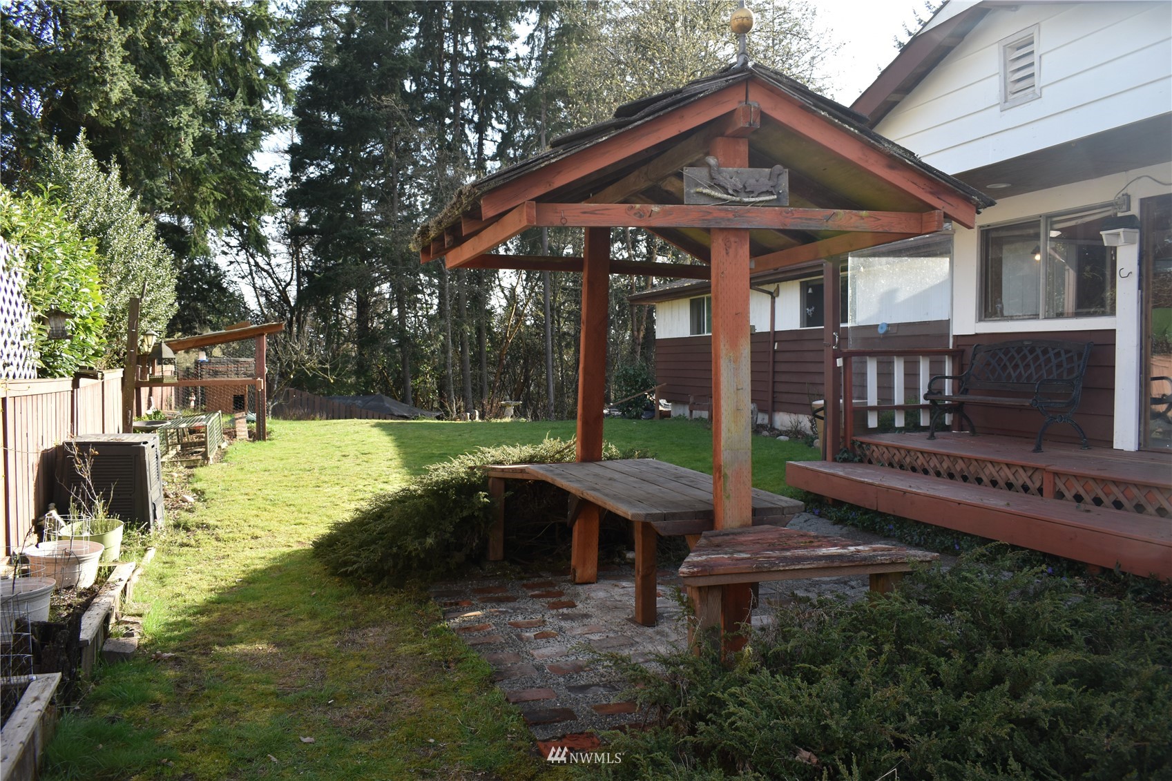 819 Sheridan Road Bremerton, WA 98310 - Photo 27 of 40 a view of a house with backyard and sitting area