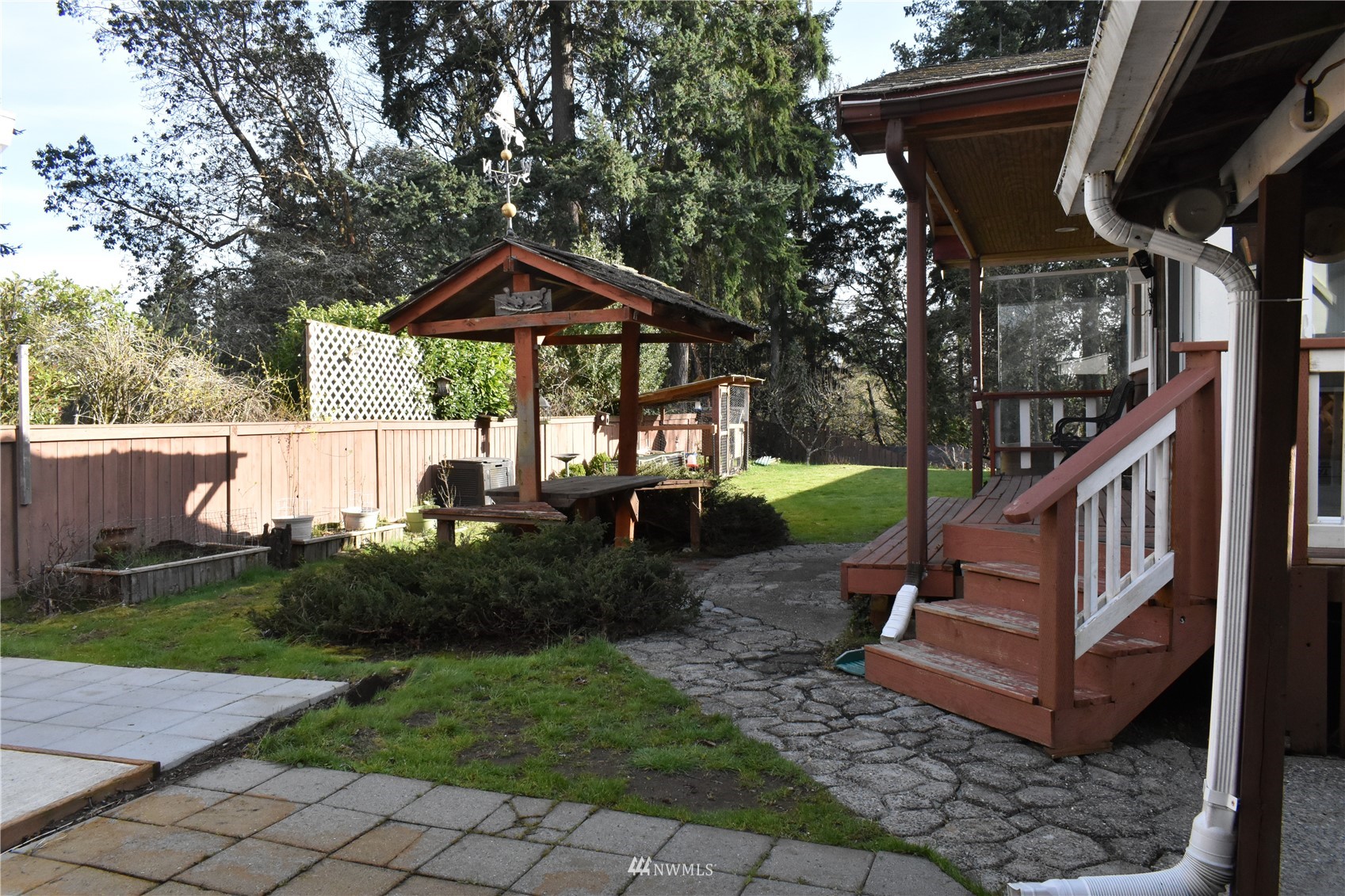 819 Sheridan Road Bremerton, WA 98310 - Photo 29 of 40 a view of a house with backyard and sitting area