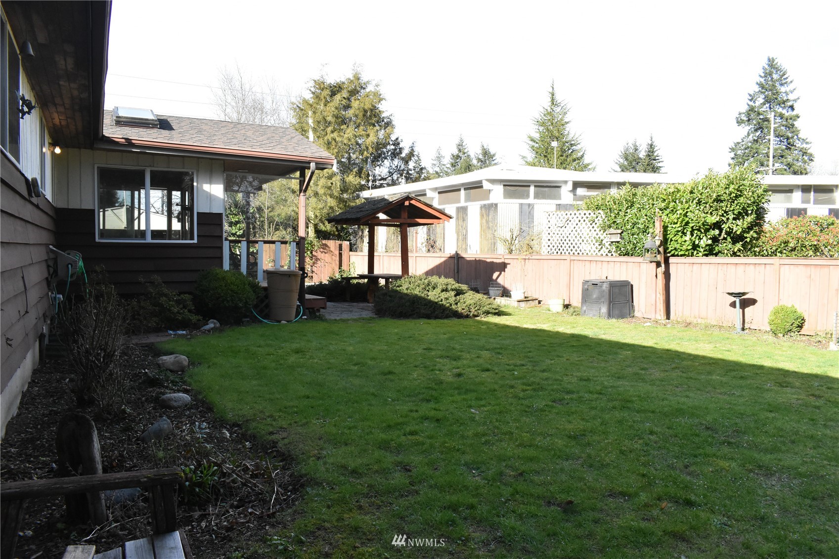 819 Sheridan Road Bremerton, WA 98310 - Photo 31 of 40 a view of a house with backyard and sitting area