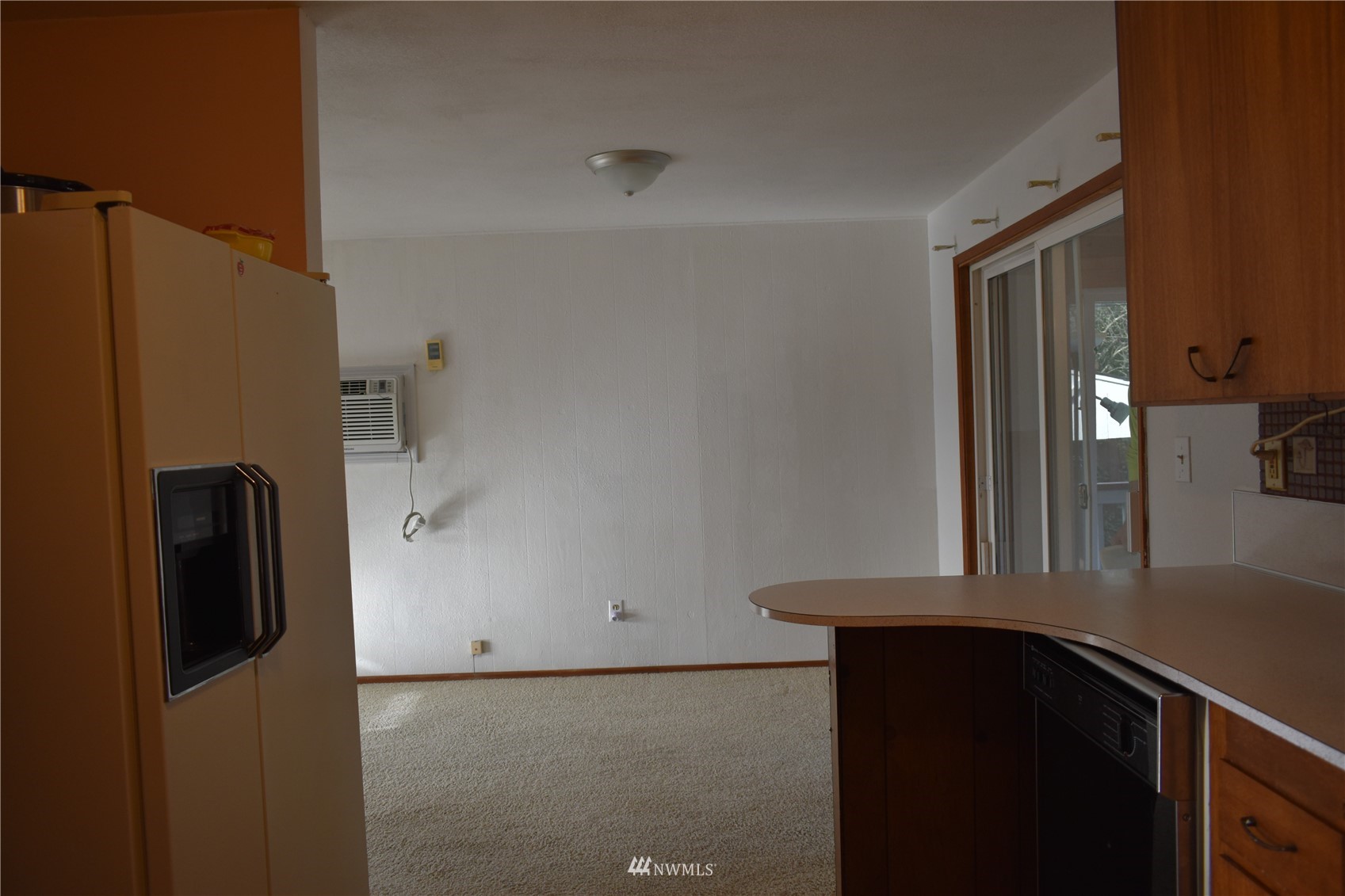 819 Sheridan Road Bremerton, WA 98310 - Photo 8 of 40 a view of a kitchen from a hallway