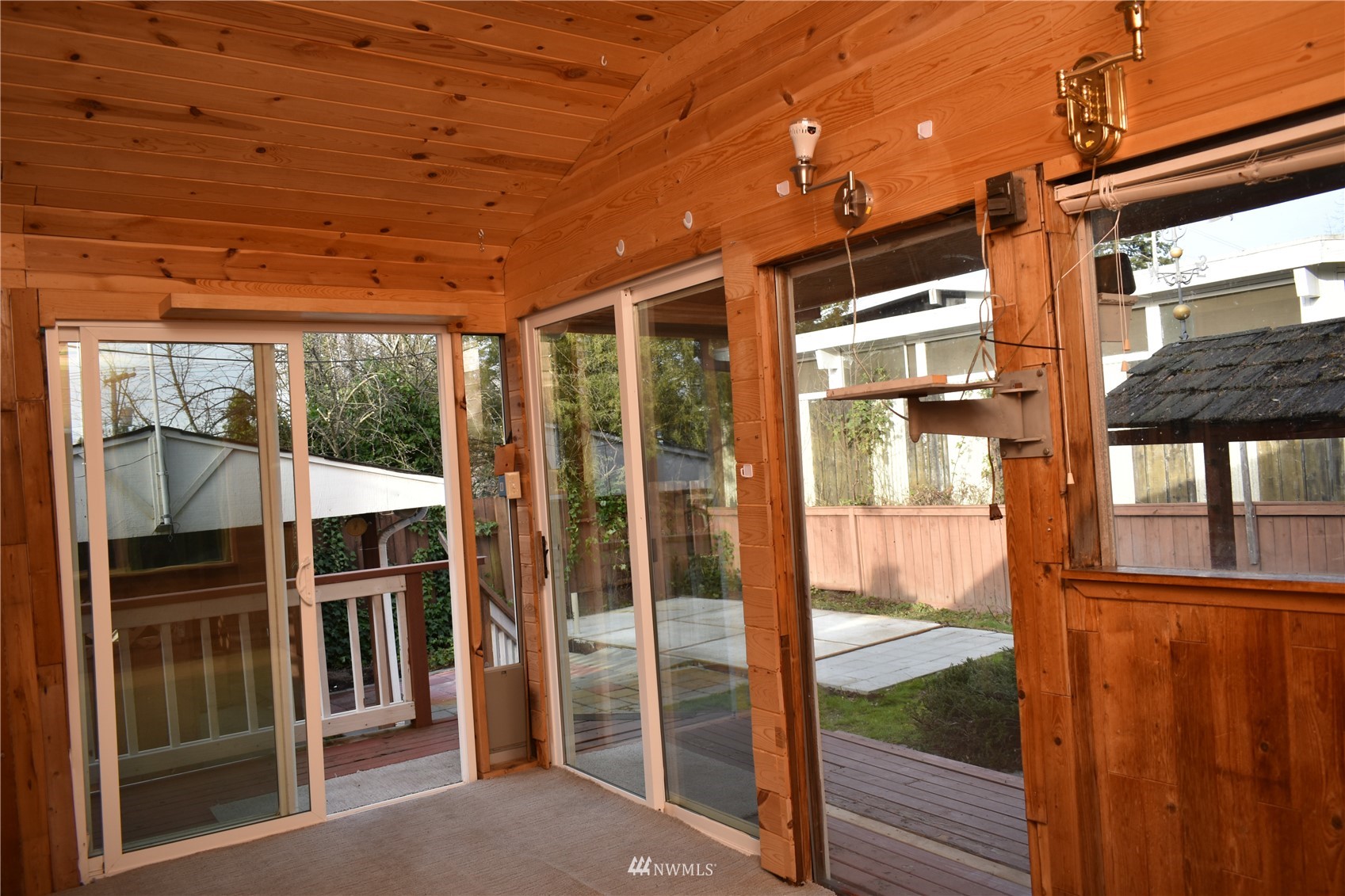819 Sheridan Road Bremerton, WA 98310 - Photo 10 of 40 a porch with a glass door