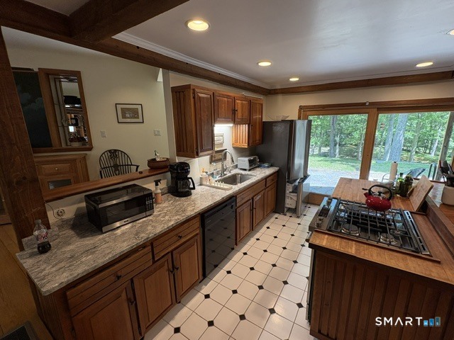 40 Looking Glass Hill Road Litchfield, CT 06750 - Photo 13 of 33 a kitchen with sink a stove and a refrigerator