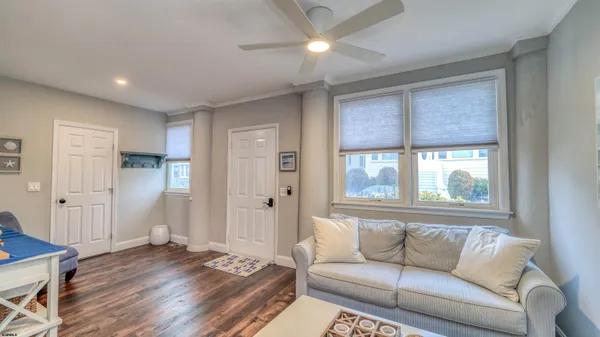a living room with furniture and a window