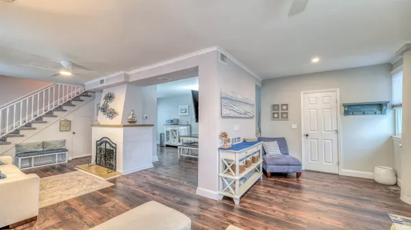 a view of livingroom with furniture and staircase