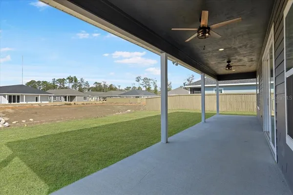 a view of an house with backyard porch and kitchen