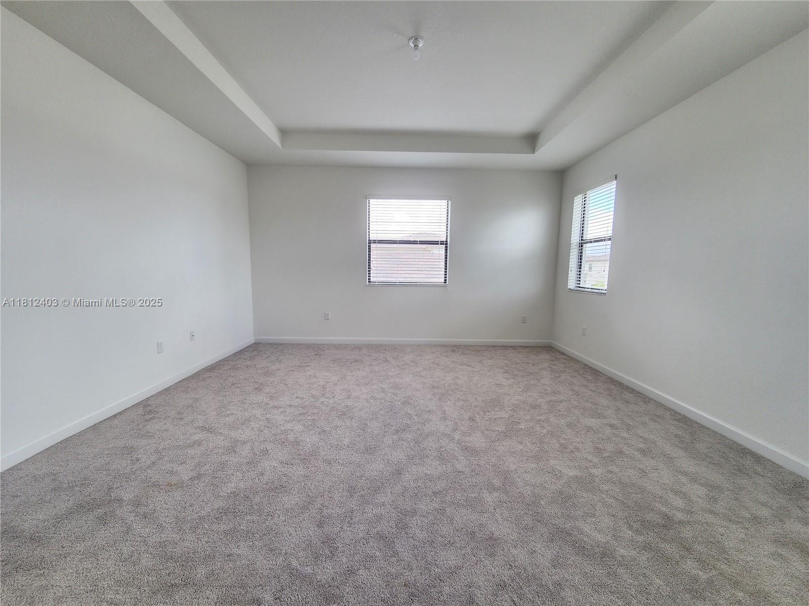 12959 Southwest 229th Lane Miami, FL 33170 - Photo 14 of 28 an empty room with a window