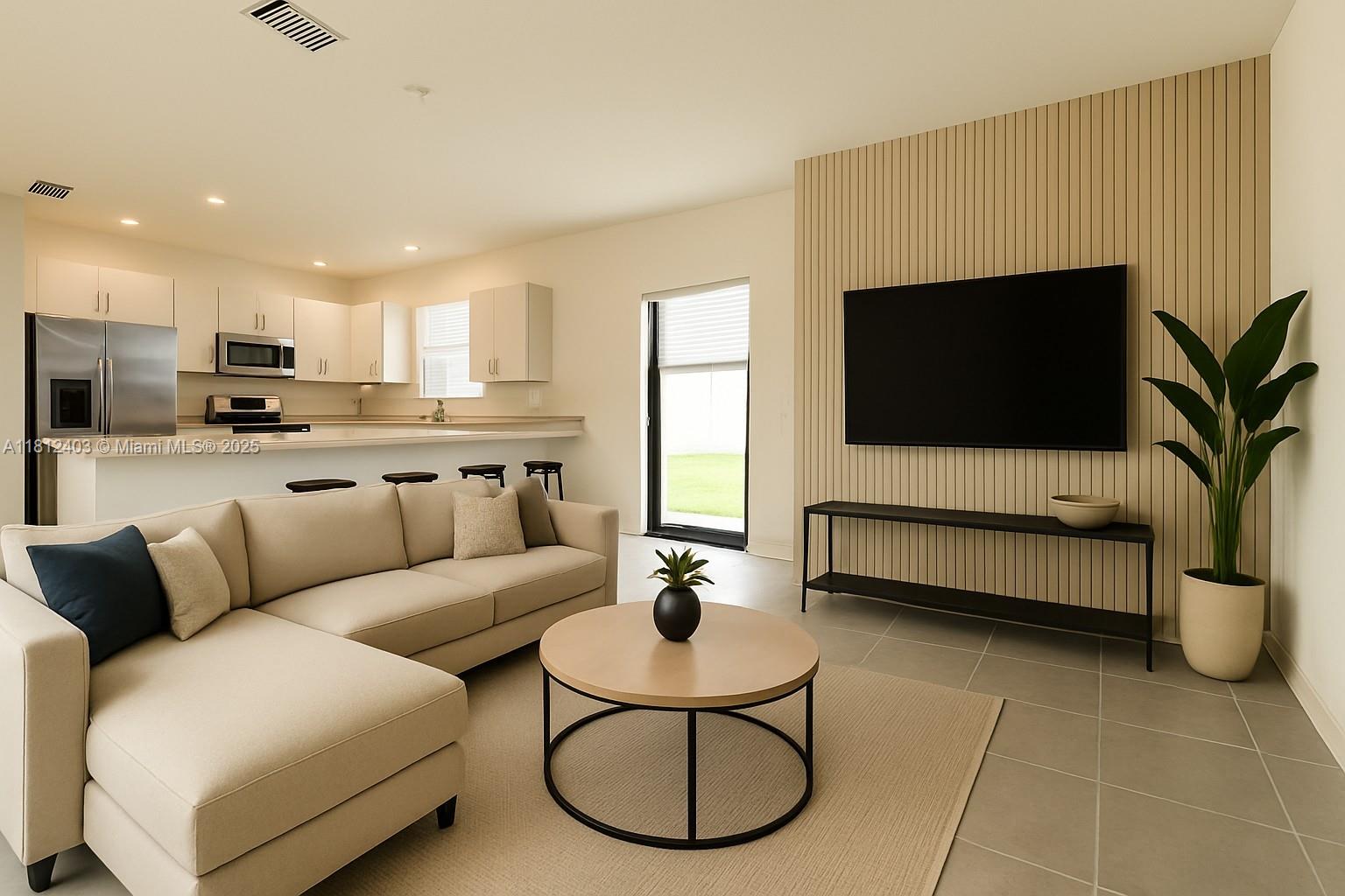 12959 Southwest 229th Lane Miami, FL 33170 - Photo 9 of 28 a living room with furniture a flat screen tv and a window
