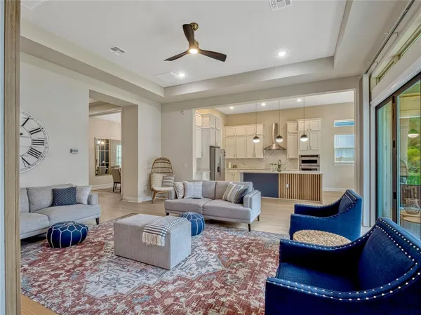 a living room with furniture and a rug