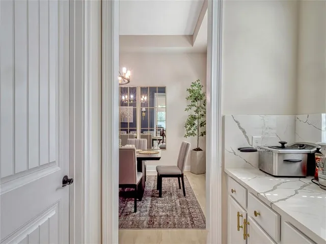 a view of a kitchen and dining room
