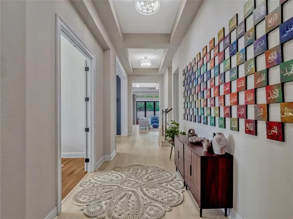 a living room with furniture and a rug