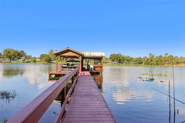a view of a lake with a large bridge