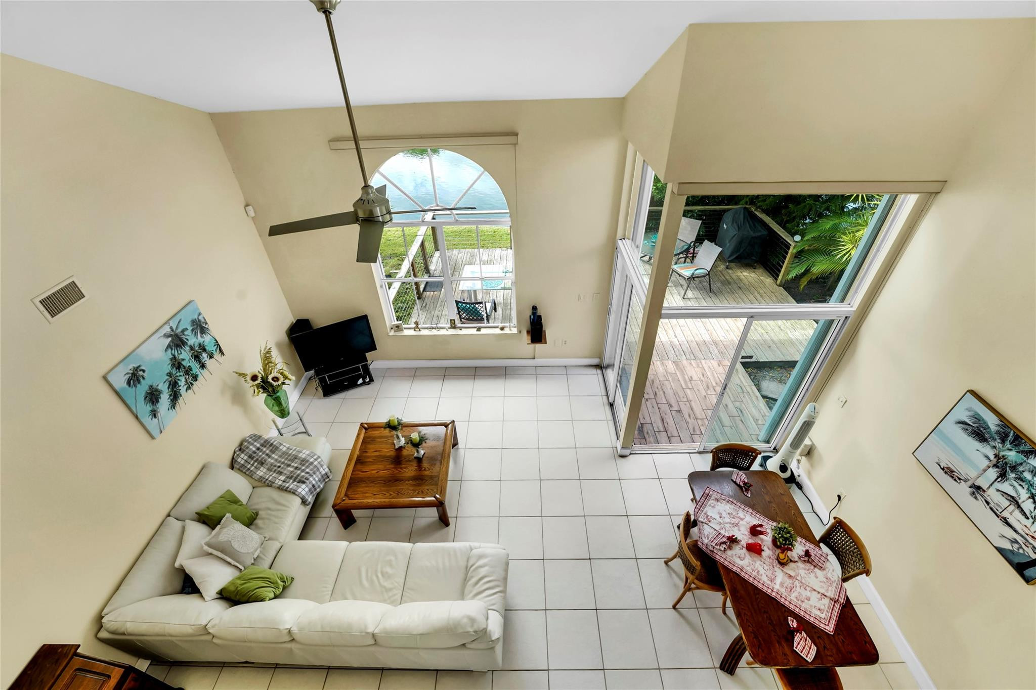 3130 North 38th Avenue Hollywood, FL 33021 - Photo 12 of 42 a living room with furniture and a flat screen tv