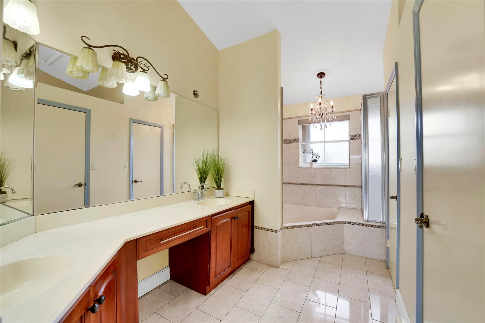 3130 North 38th Avenue Hollywood, FL 33021 - Photo 21 of 42 a spacious bathroom with a granite countertop sink a mirror and shower