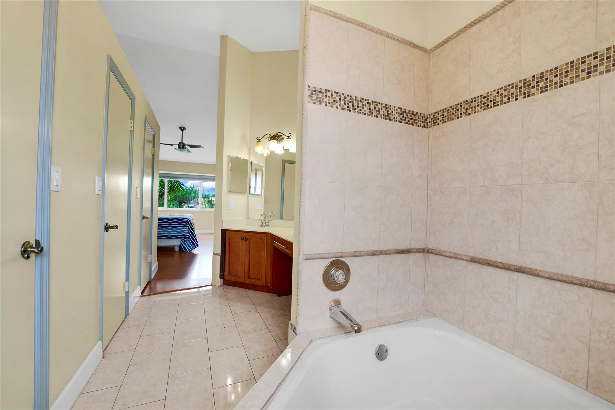 3130 North 38th Avenue Hollywood, FL 33021 - Photo 22 of 42 a bathroom with a tub and shower