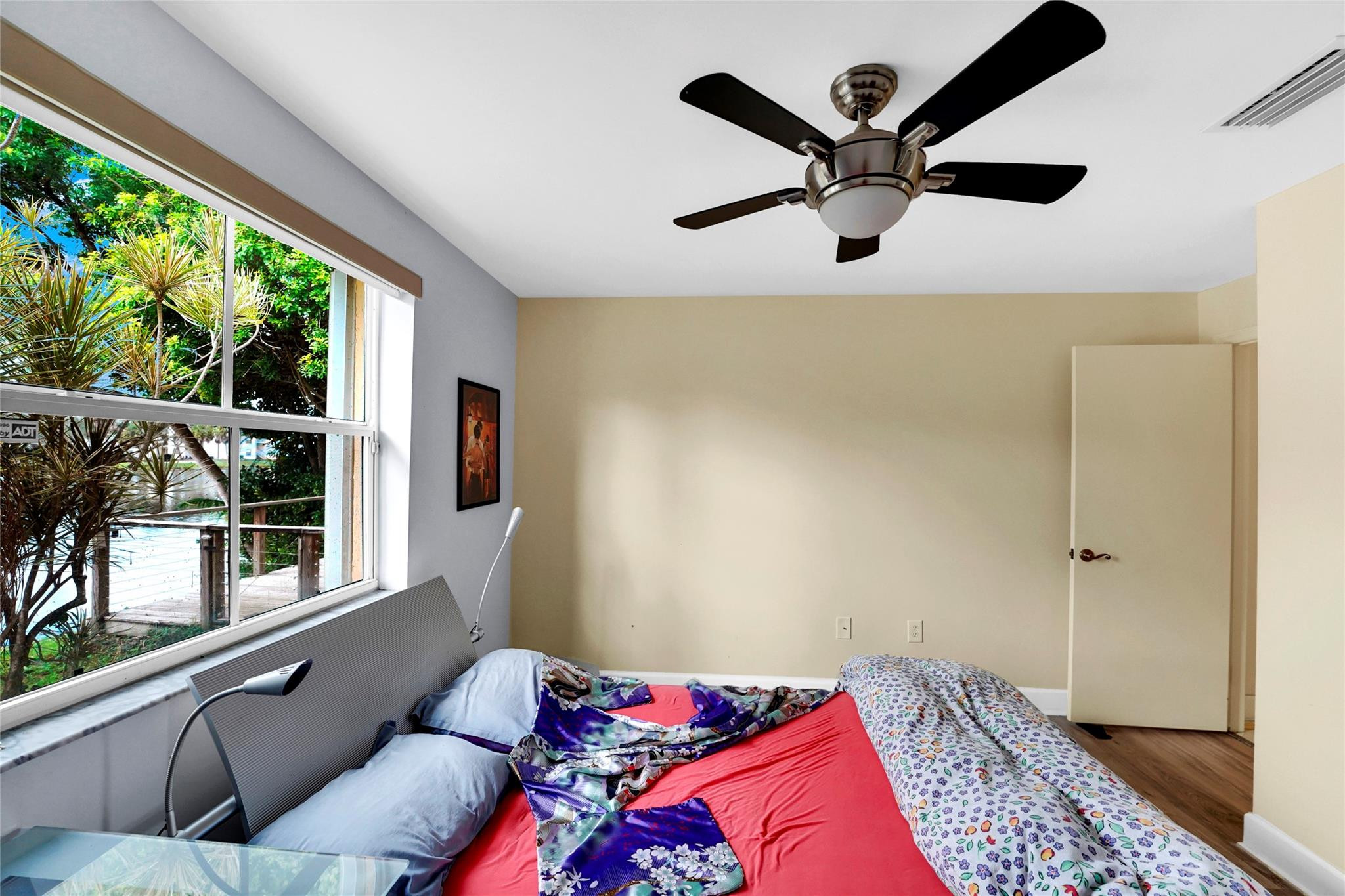 3130 North 38th Avenue Hollywood, FL 33021 - Photo 28 of 42 a bedroom with a large bed and a window