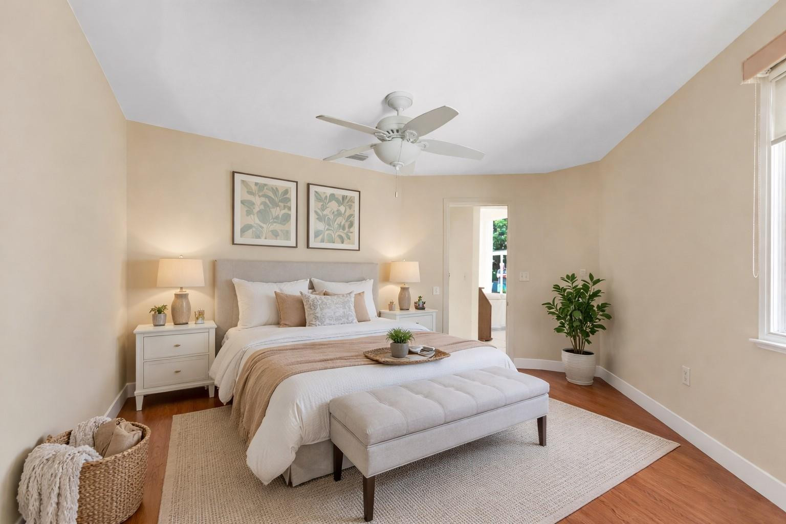 3130 North 38th Avenue Hollywood, FL 33021 - Photo 31 of 42 a bedroom with bed couch and a potted plant