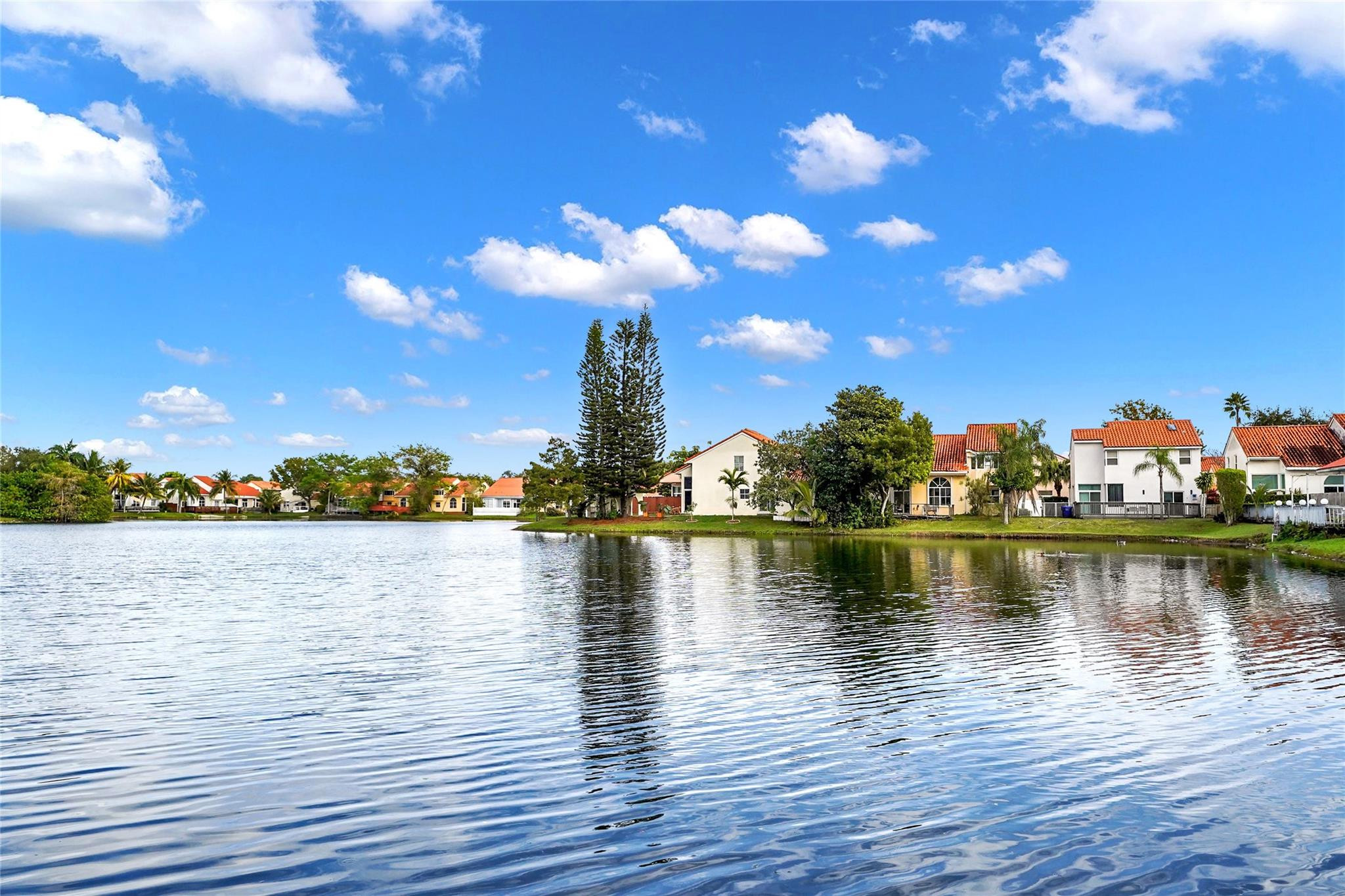 3130 North 38th Avenue Hollywood, FL 33021 - Photo 41 of 42 a view of an ocean with boats and trees in the background