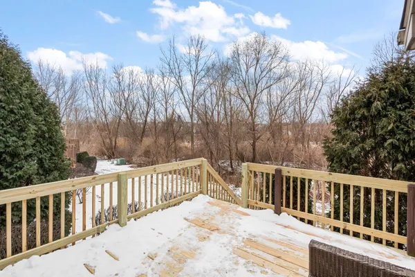 a view of a wooden roof deck
