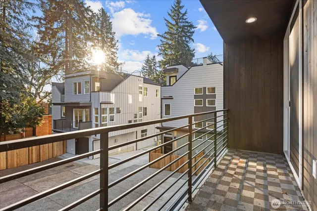 a view of a brick house with a large window