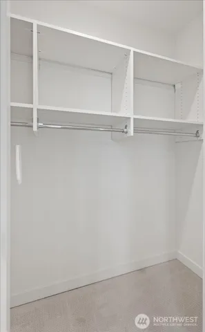 a view of an empty walk in closet