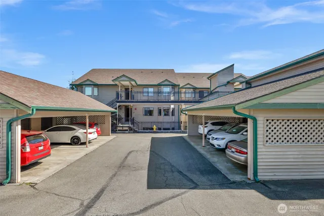a view of a room with a car and garage