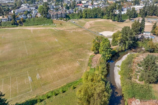 a view of a swimming pool and an outdoor space