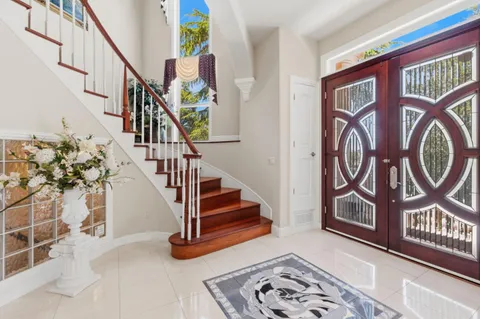 a view of entryway with a front door