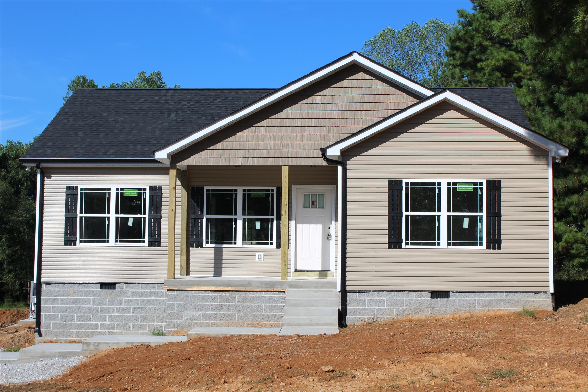 0 Saw Mill Road Dickson, TN 37055 - Photo 1 of 6 a front view of a house with a yard
