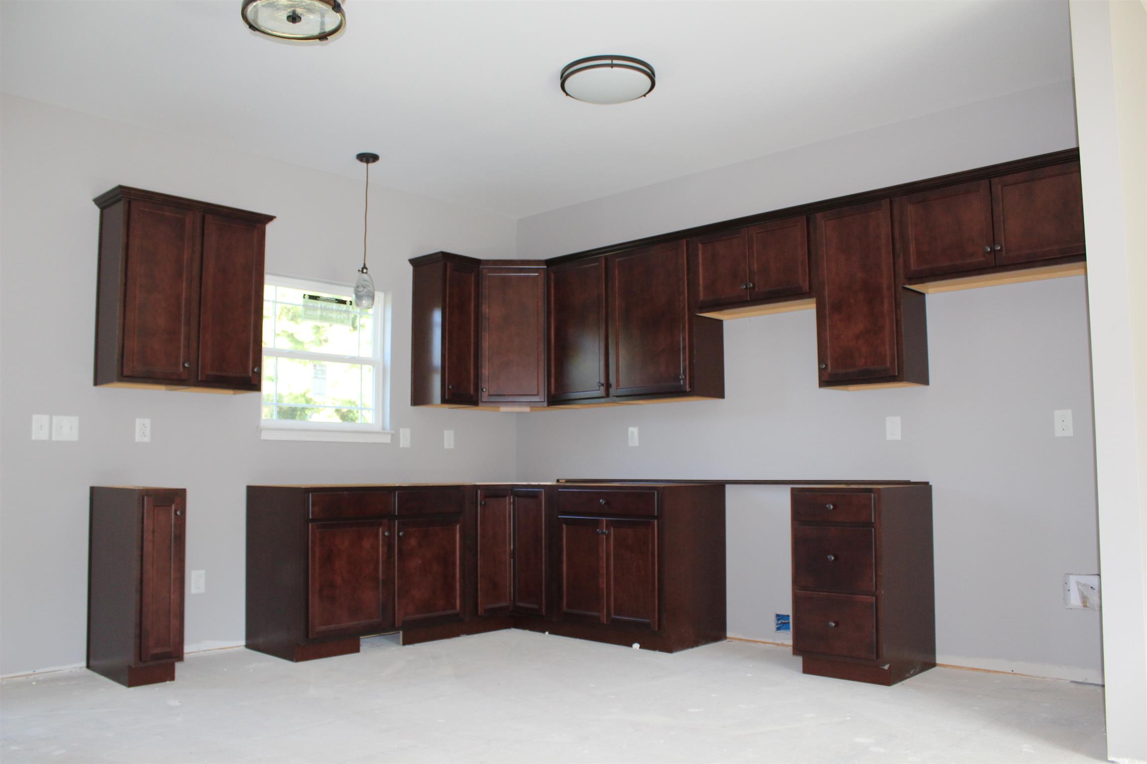 0 Saw Mill Road Dickson, TN 37055 - Photo 2 of 6 a kitchen with a sink and cabinets