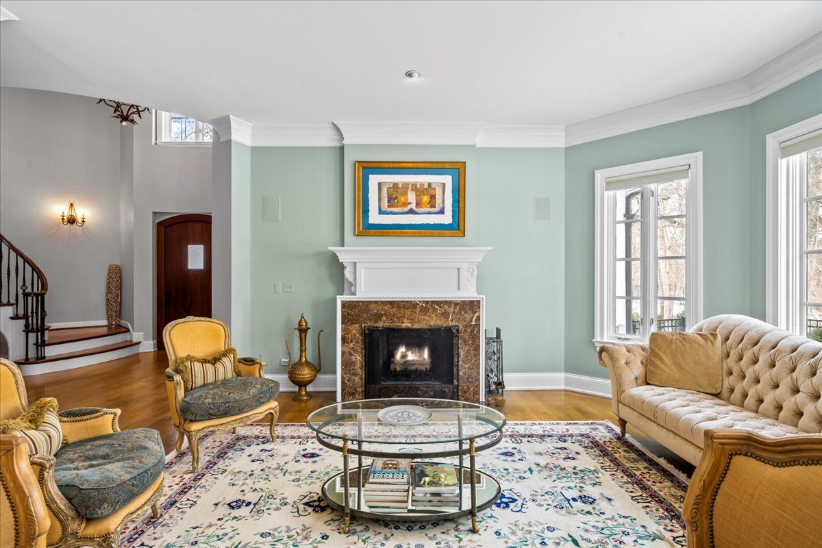 697 Bluff Road Lake Bluff, IL 60044 - Photo 6 of 49 a living room with furniture and a fireplace