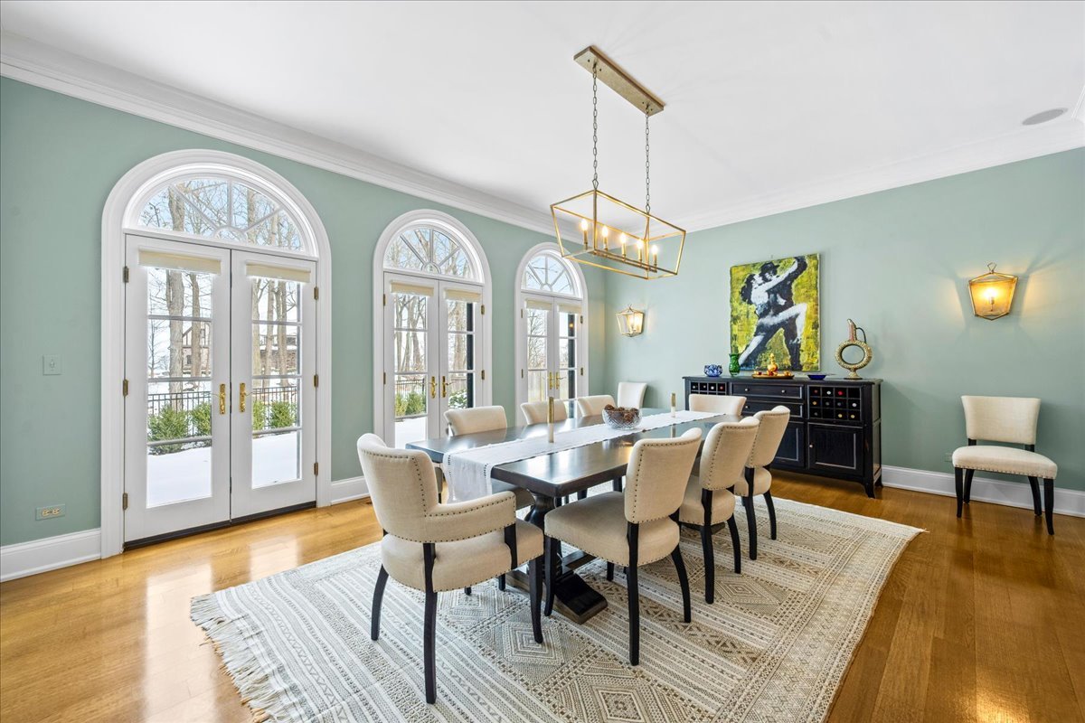 697 Bluff Road Lake Bluff, IL 60044 - Photo 7 of 49 a view of a dining room with furniture window and wooden floor
