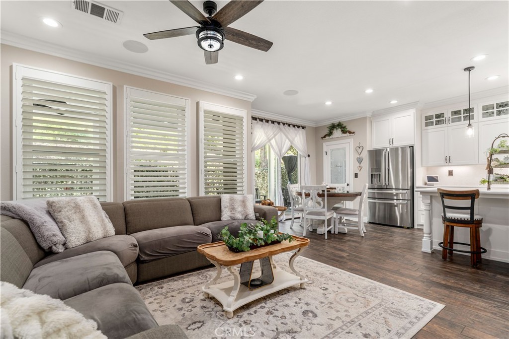8750 East Heatherwood Road Anaheim Hills, CA 92808 - Photo 19 of 60 a living room with furniture and a large window