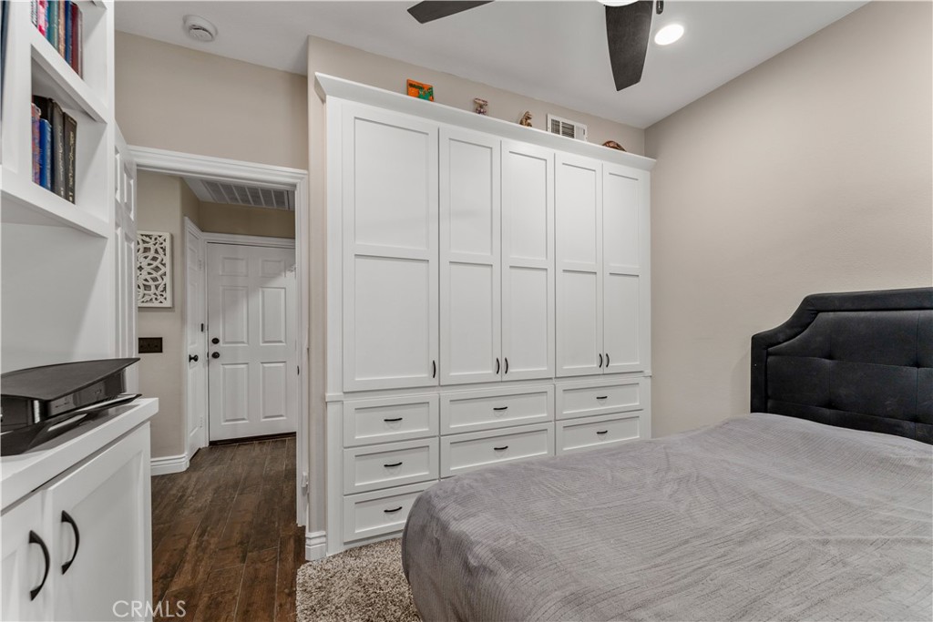 8750 East Heatherwood Road Anaheim Hills, CA 92808 - Photo 20 of 60 a bedroom with a bed and a window