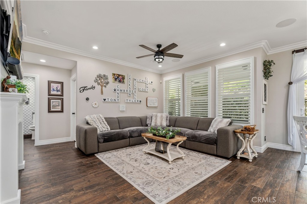 8750 East Heatherwood Road Anaheim Hills, CA 92808 - Photo 3 of 60 a living room with furniture and a large window