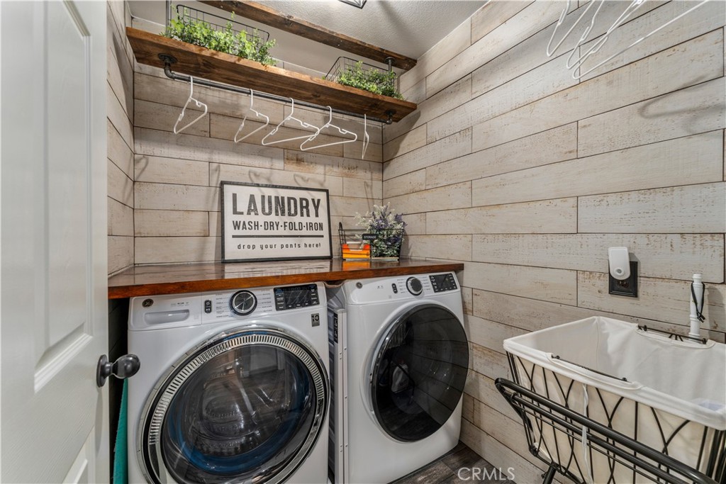 8750 East Heatherwood Road Anaheim Hills, CA 92808 - Photo 36 of 60 a utility room with dryer and washer