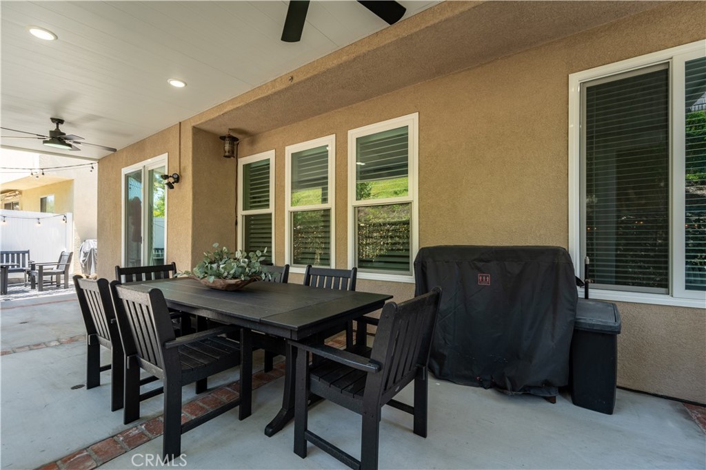 8750 East Heatherwood Road Anaheim Hills, CA 92808 - Photo 37 of 60 a view of a dining room with furniture and window