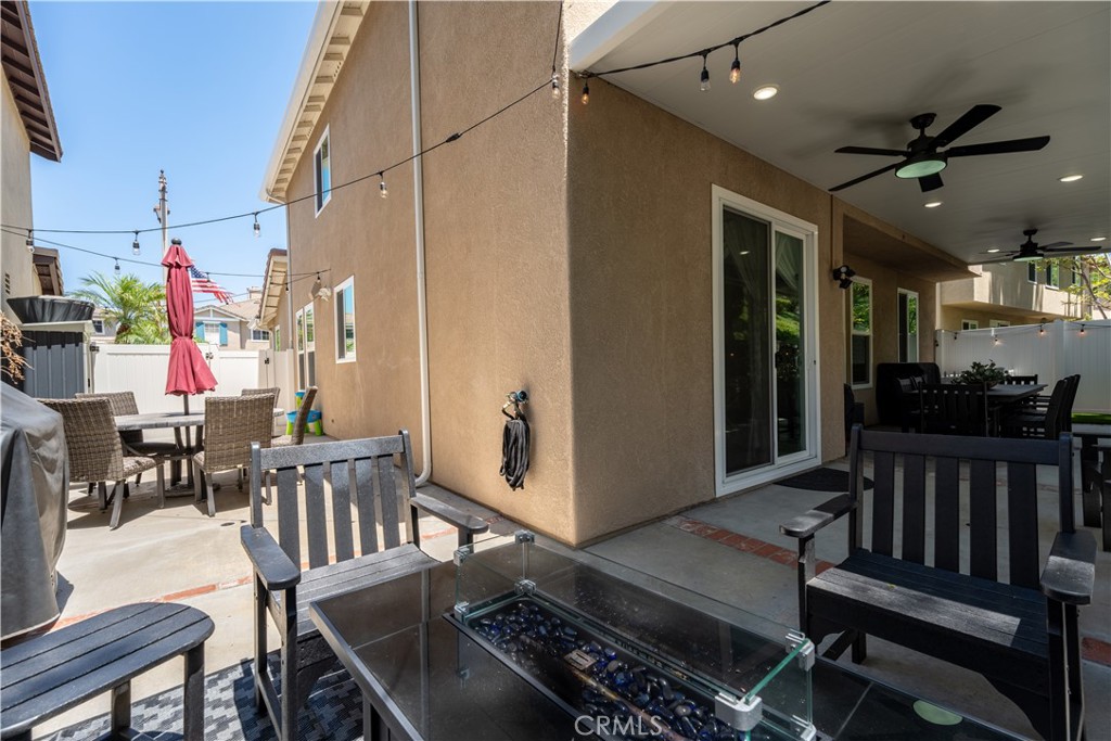 8750 East Heatherwood Road Anaheim Hills, CA 92808 - Photo 40 of 60 a view of a dining room with furniture window and wooden floor